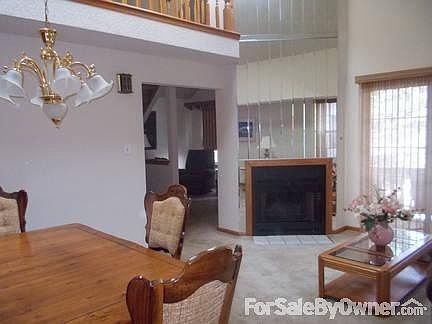 LIVING ROOM
						:
						Living Room with Fireplace, Balcony, Cathedral Ceiling and Skylight