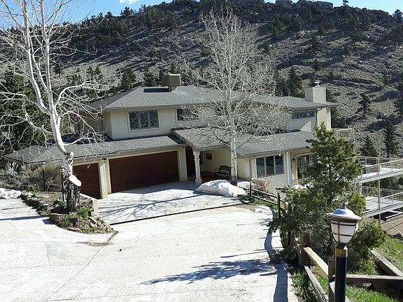 Driveway view. 2 garage and 3 outside parking spaces available to tenants.