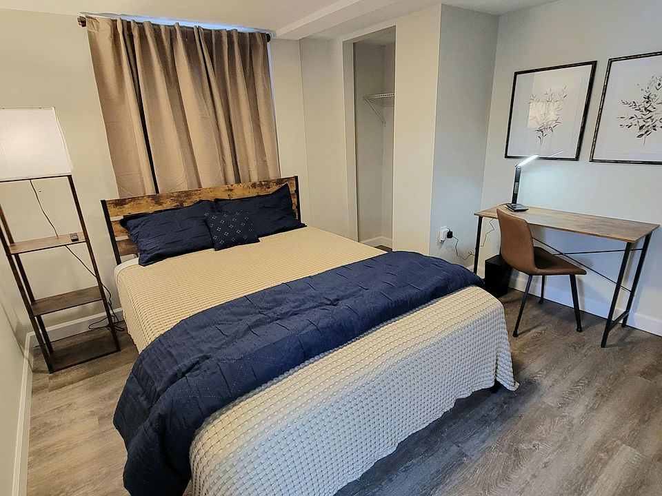 Lower level room with private half bath on main floor and shared shower on 2nd floor.