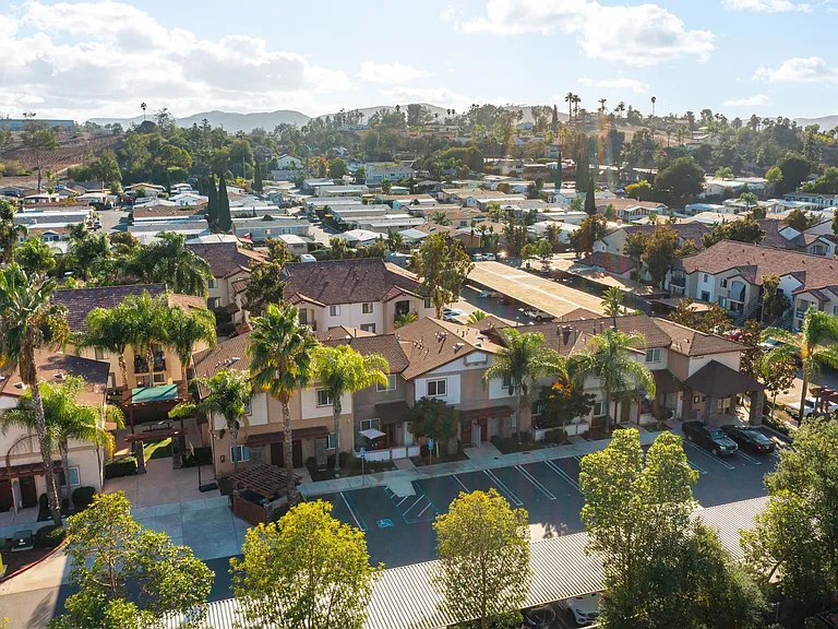 Arial view of parking and townhomes at The Nines Townhomes in Escondido, California.