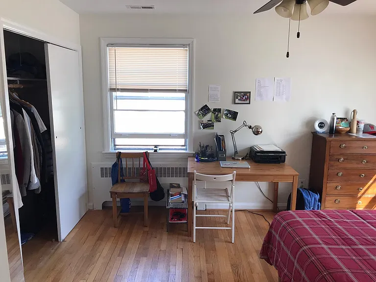 Bedroom #1, hardwood floor; with 2 windows 90 degrees, ceiling fan and large in wall closet.