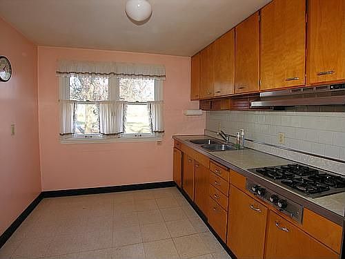 Kitchen with Birch Cabinets. Perfect eat-in kitchen!