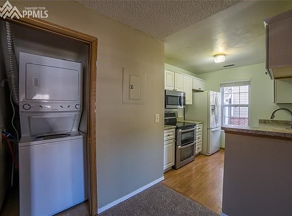 Stack Washer & Dryer and Kitchen