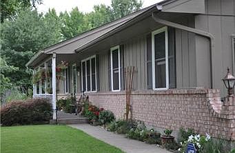 Plant Lined Walk Leads to Covered Front Porch