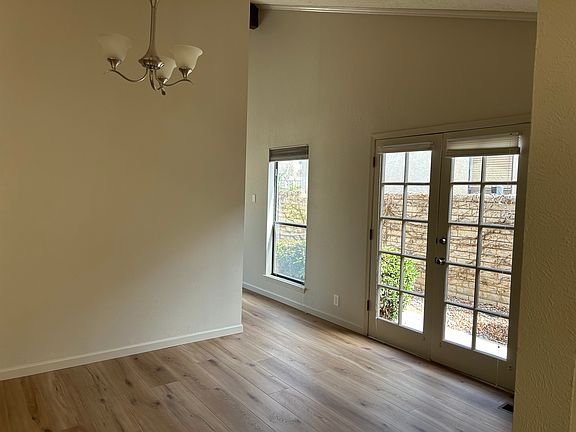 Dining area and French doors out to side yard.