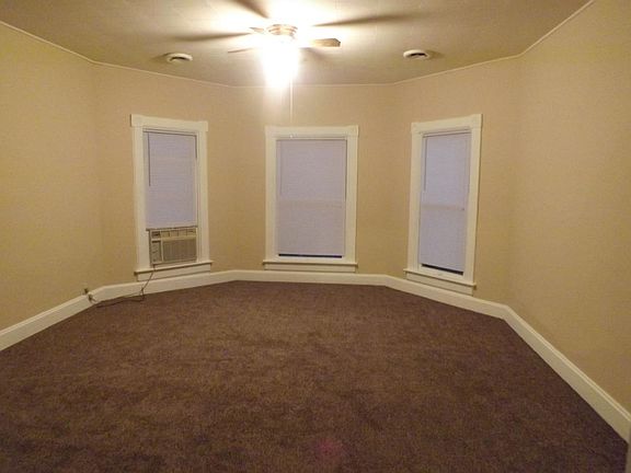 Open extra large living room with access to bonus room for s