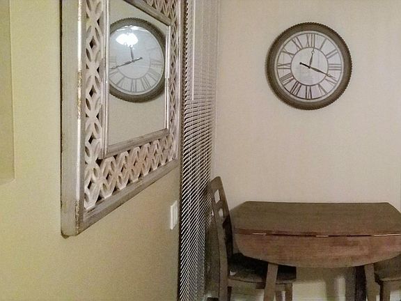 Space saving table and chairs with fold down leaves