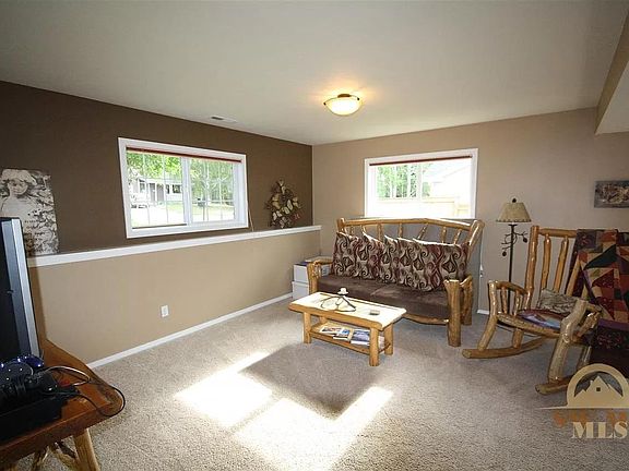 Downstairs bedroom or family room with ensuite bathroom and side entrance