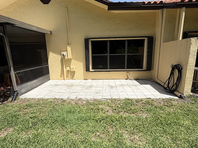Back patio behind master bedroom