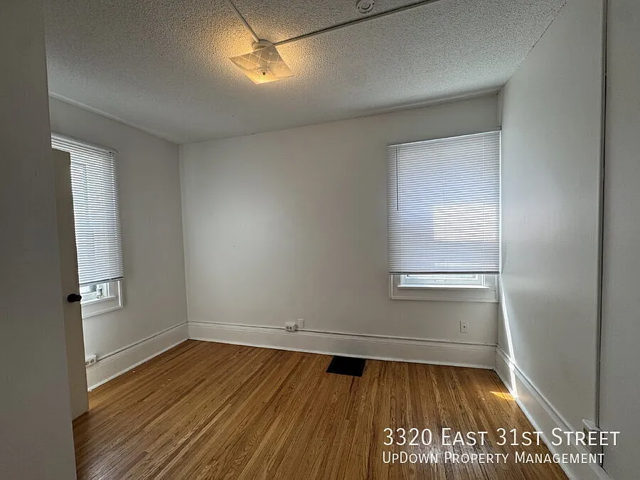 Charming 3-Bed Sanctuary with Gleaming Hardwood Floors at 3320 East 31st Street, Minneapolis! — Photo 4