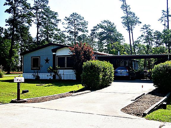 View of home, Carport & Driveway