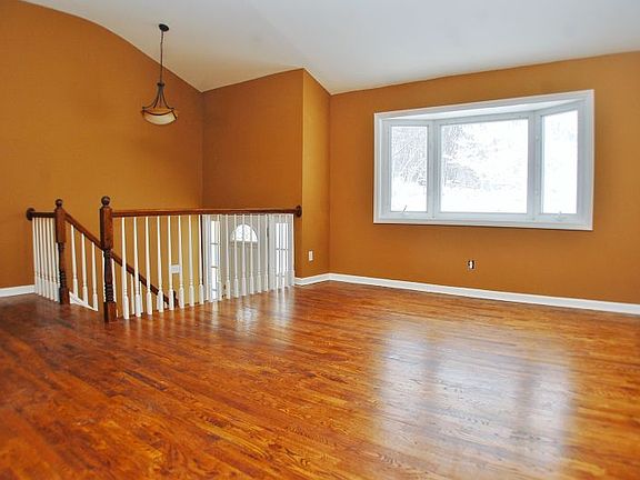 Foyer and living w/ bay 