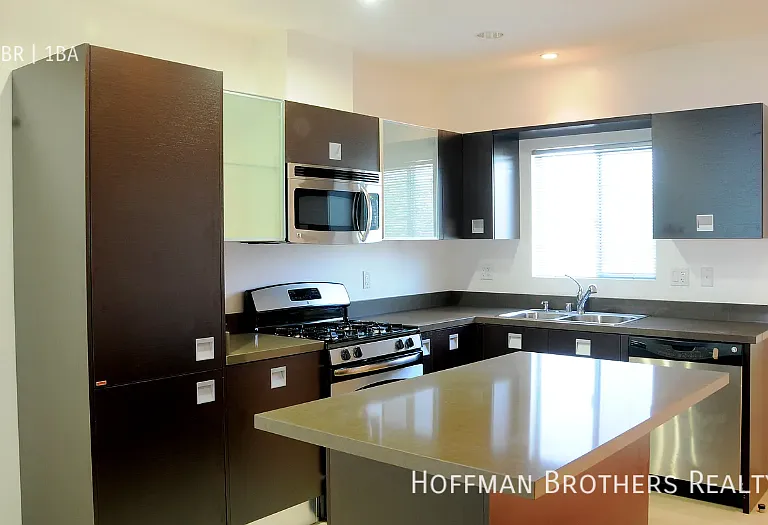 9100 Whitworth Dr — Photo 1