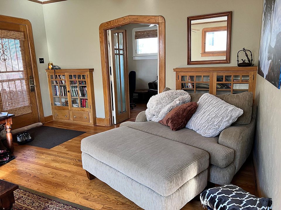 Front living space - looking at the front door and into the office.