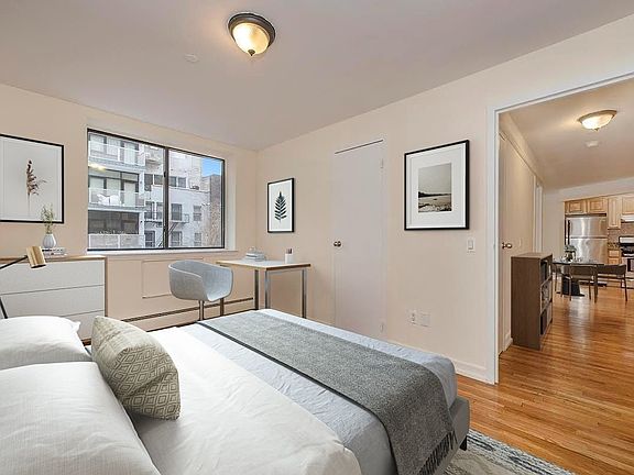 2nd image of 394 E 8th St APT 4E