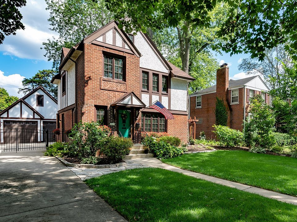 Fabulous Tudor just a block from Wheaton College with  2 level oversized 2.5 car detached garage tha