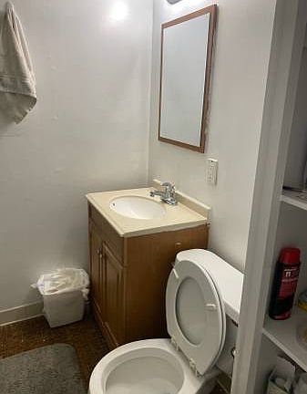 Bathroom , and a small toilet with new shower stall new sink naw cabinet