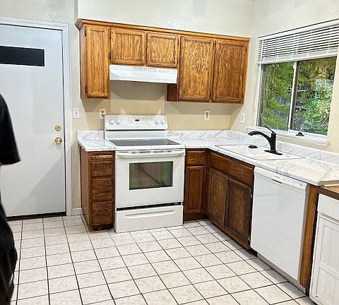 Kitchen view from family room and living room
