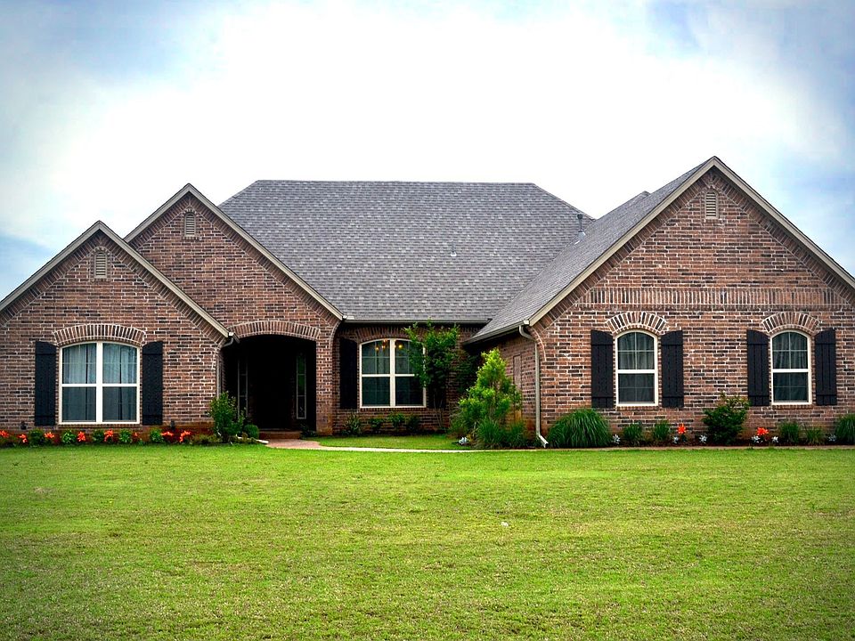 Beautifully Landscaped with Custom Shutters