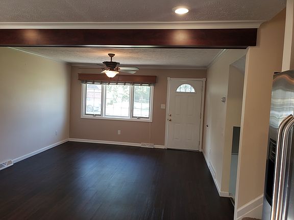 family room with blinds lifted