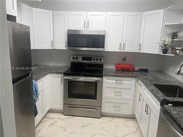 5952 NW 25th Pl — Photo 1