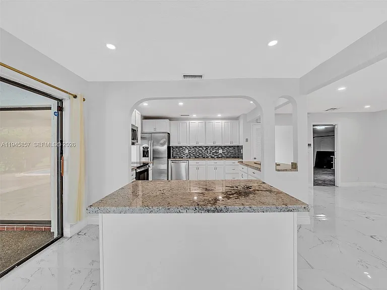 10251 NW 39th Ct — Photo 35