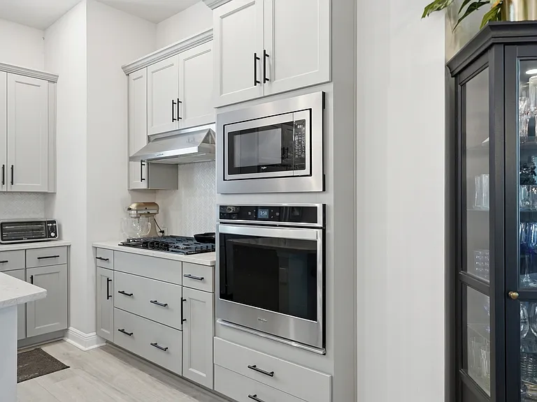 Kitchen with gas stove, in-wall oven, extra large island, and walk-in pantry