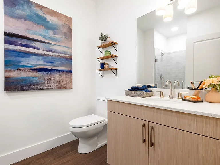a bathroom with a toilet and a sink