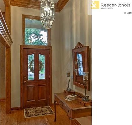 Step inside to the 2 story entry with newly refinished hardwood
