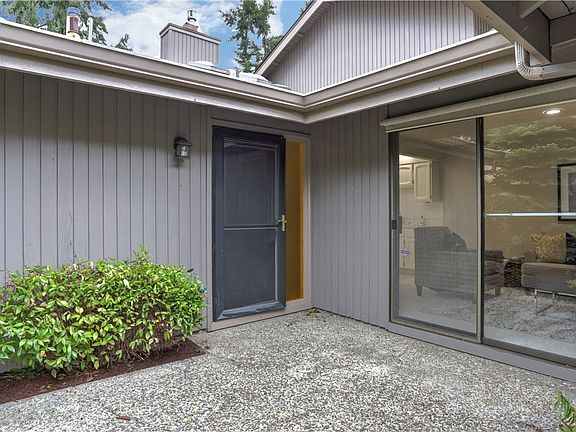 The front courtyard is the perfect place to enjoying your morning coffee or your evening toast to a beautiful day. Open the sliding glass door to bring the outdoors in.