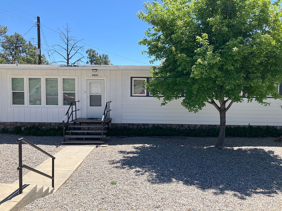 Front Yard, gravel, shade tree, ornamental shrubs on the north side of house.