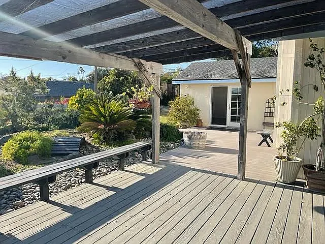 Rear deck along rear to Master Bedroom Suite