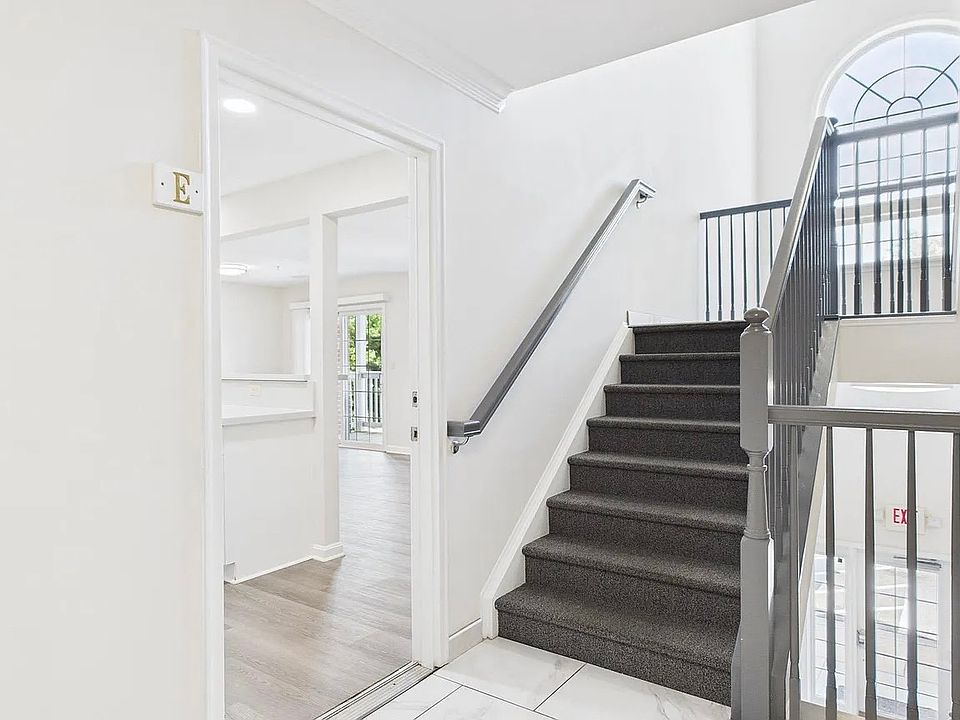 The apartment located on a first floor that can be accessed by 12 steps or a large elevator