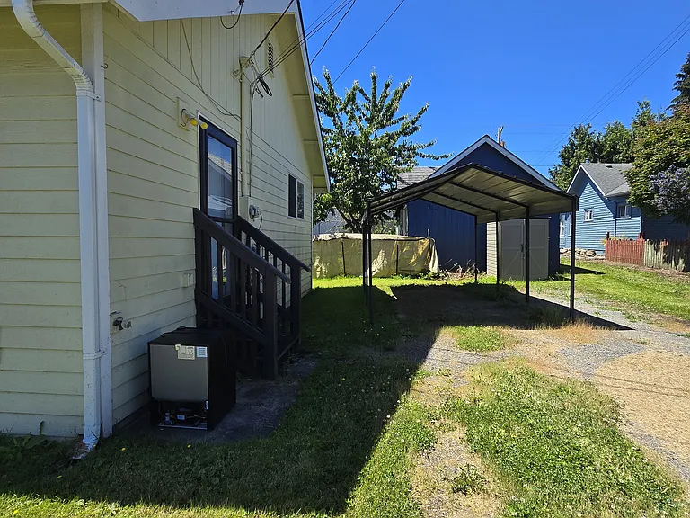 Back yard/carport