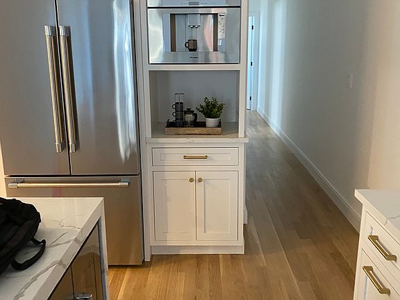 Kitchen with in-built espresso/coffee machine