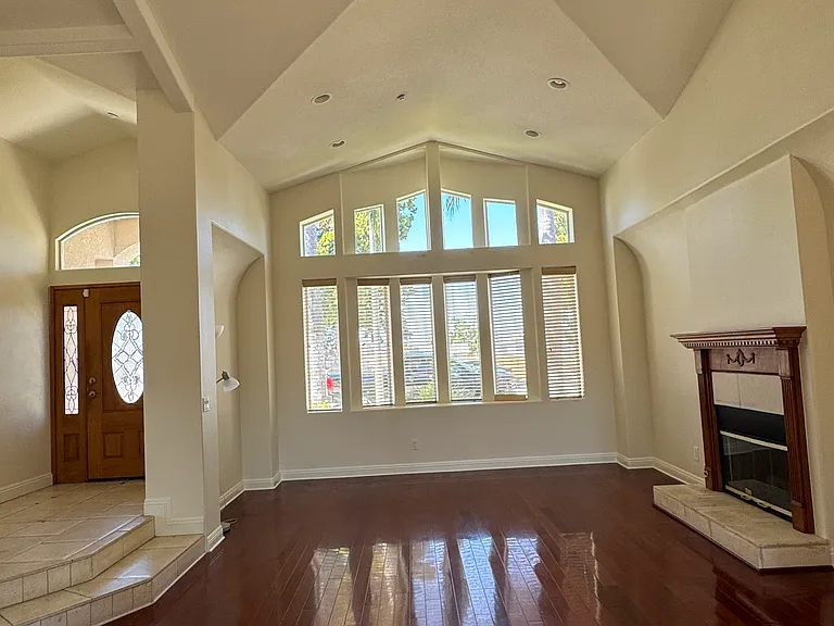 Living Room with Cathedral ceilings and High Bay Window