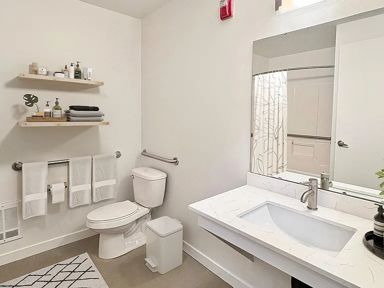 Experience the elegance of this modern bathroom, designed for comfort and style. Experience the elegance of this modern bathroom, designed for comfort and style.