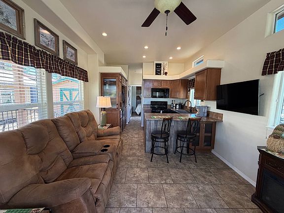 4th image of 3851 Vacation Village Dr Unit 208