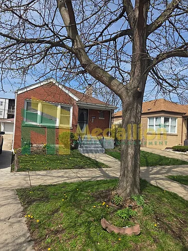 11004 S Eberhart Ave Photo 1