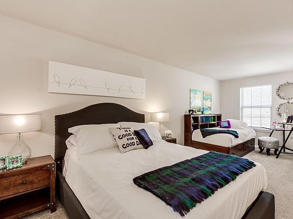 Guest bedroom with additional sitting area