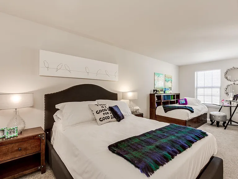 Guest bedroom with additional sitting area