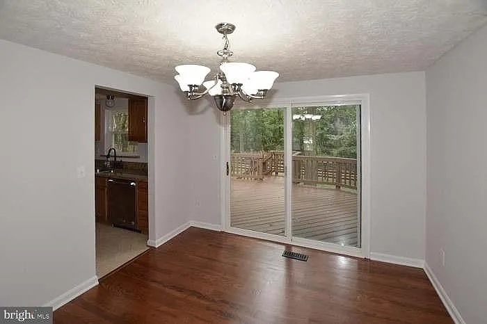 Dining room view of deck & backyard.
