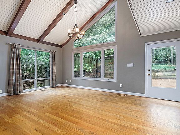 Great room showing backdoor 