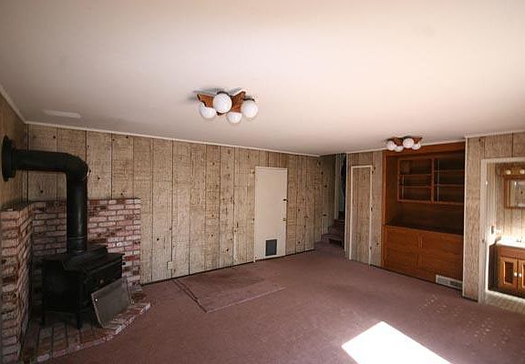 Family room with wood burning stove.