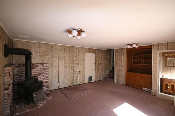 Family room with wood burning stove.