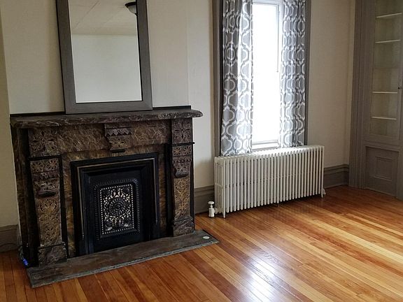 living room with decorative fireplace