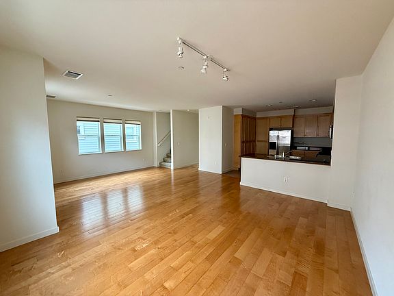 Bright, dining area with counter to kitchen