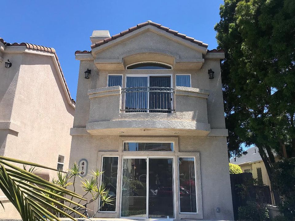 Front of house. Entry to house is on the side to the left.