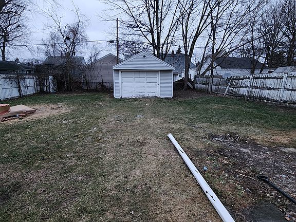 Full garage behind the privacy fences mammoth yard