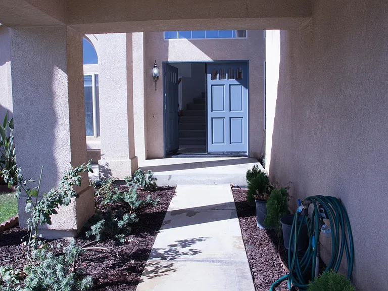 Front entrance with new landscaping and drip system installed